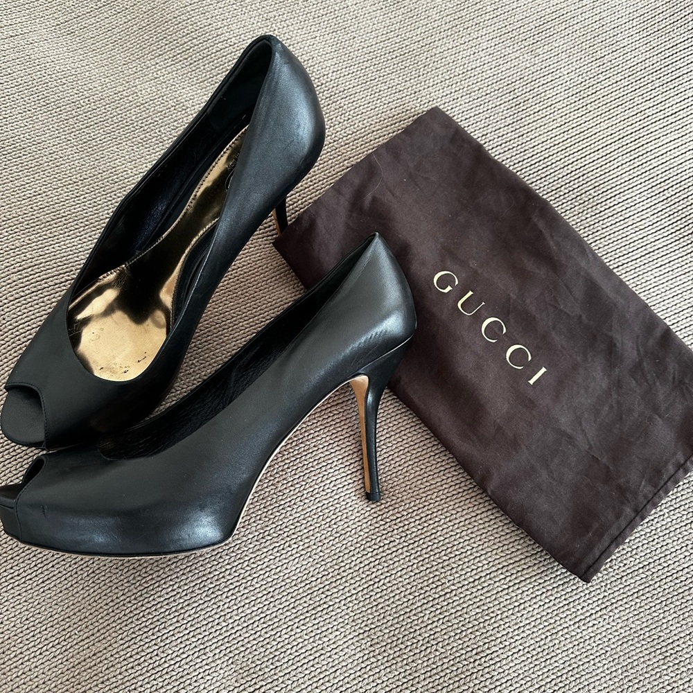Gucci platform, peep toe heels. Size 42. Black. Only wear is on bottom. Gorgeous